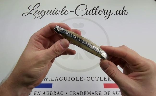 Laguiole pocket knife with hand-chiselled double plates and a ram's horn handle