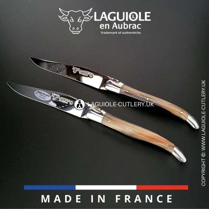 set of 2 laguiole en aubrac steak knives with zebu horn tip handles