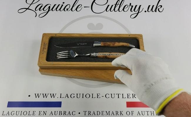 A Laguiole steak knife and fork with juniper wood handles