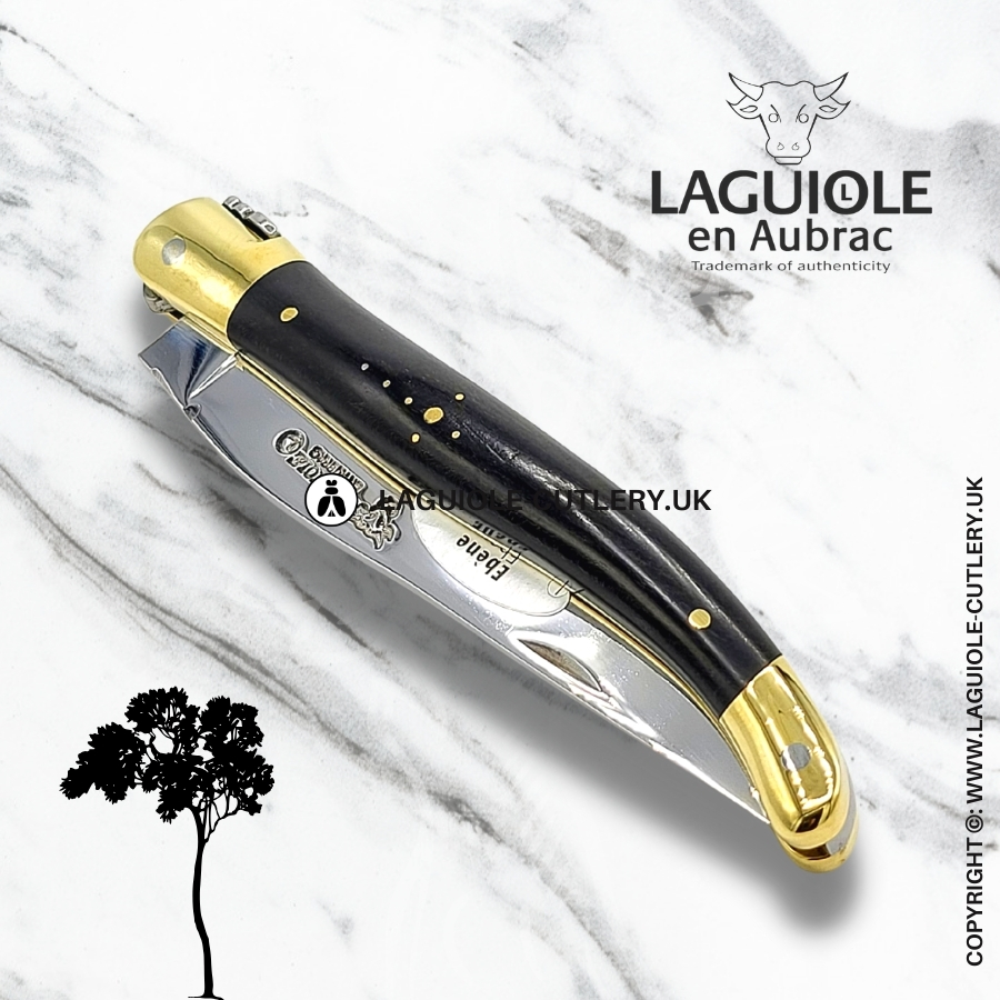 laguiole en aubrac pocket knife with ebony wood handle and brass bolsters