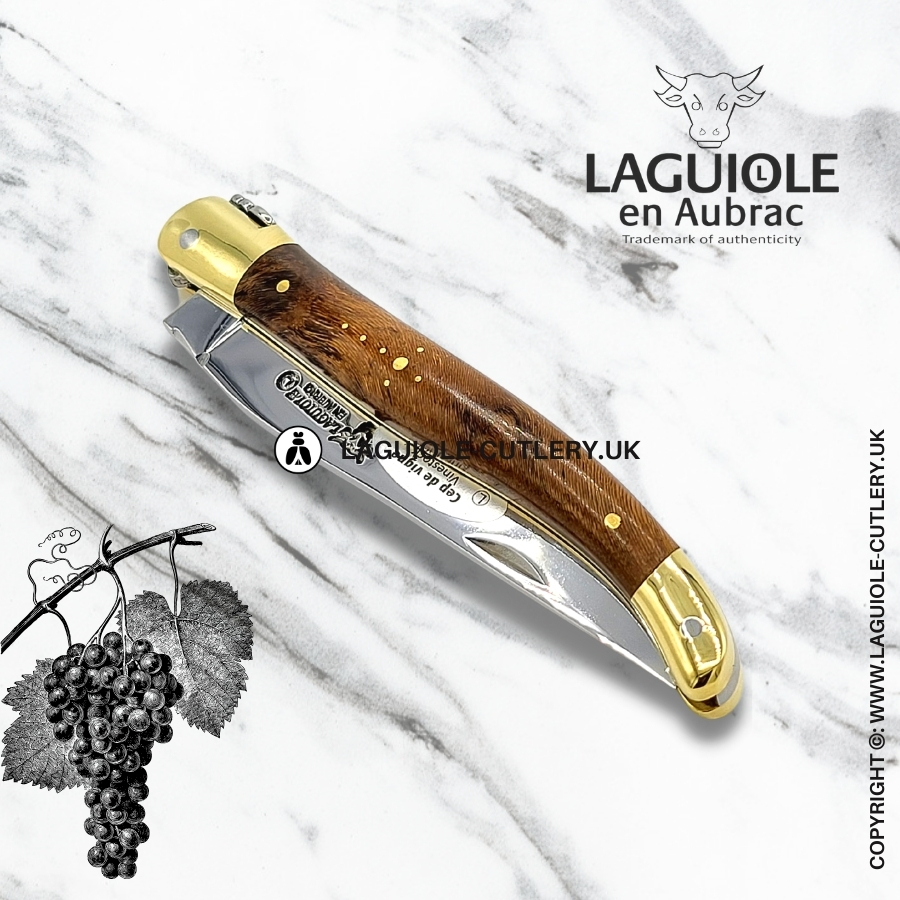 laguiole en aubrac pocket knife with grapevine wood handle and brass bolsters