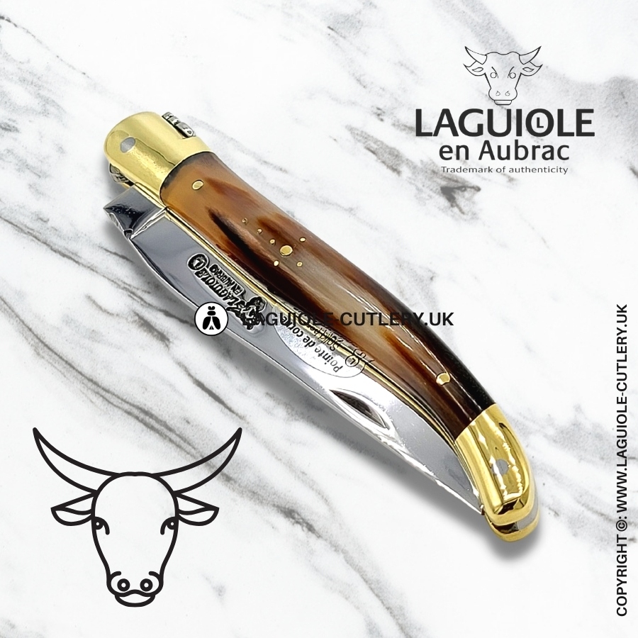 laguiole en aubrac pocket knife with horn tip handle and brass bolsters