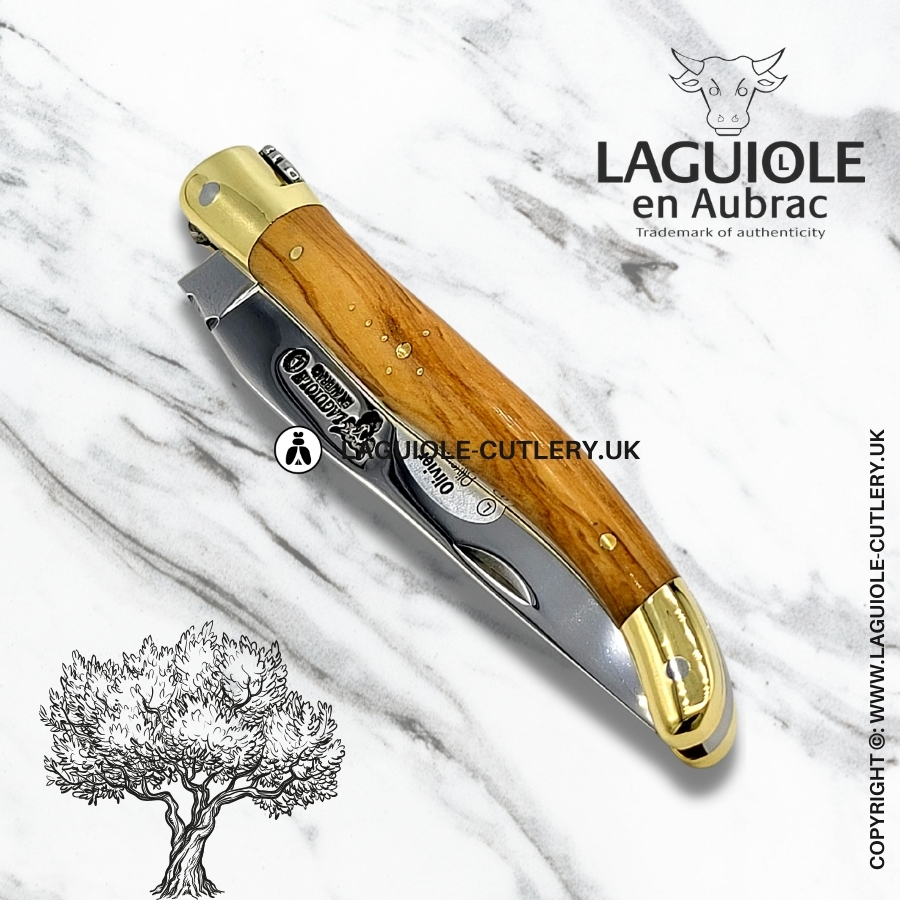 laguiole en aubrac pocket knife with olivewood handle and brass bolsters