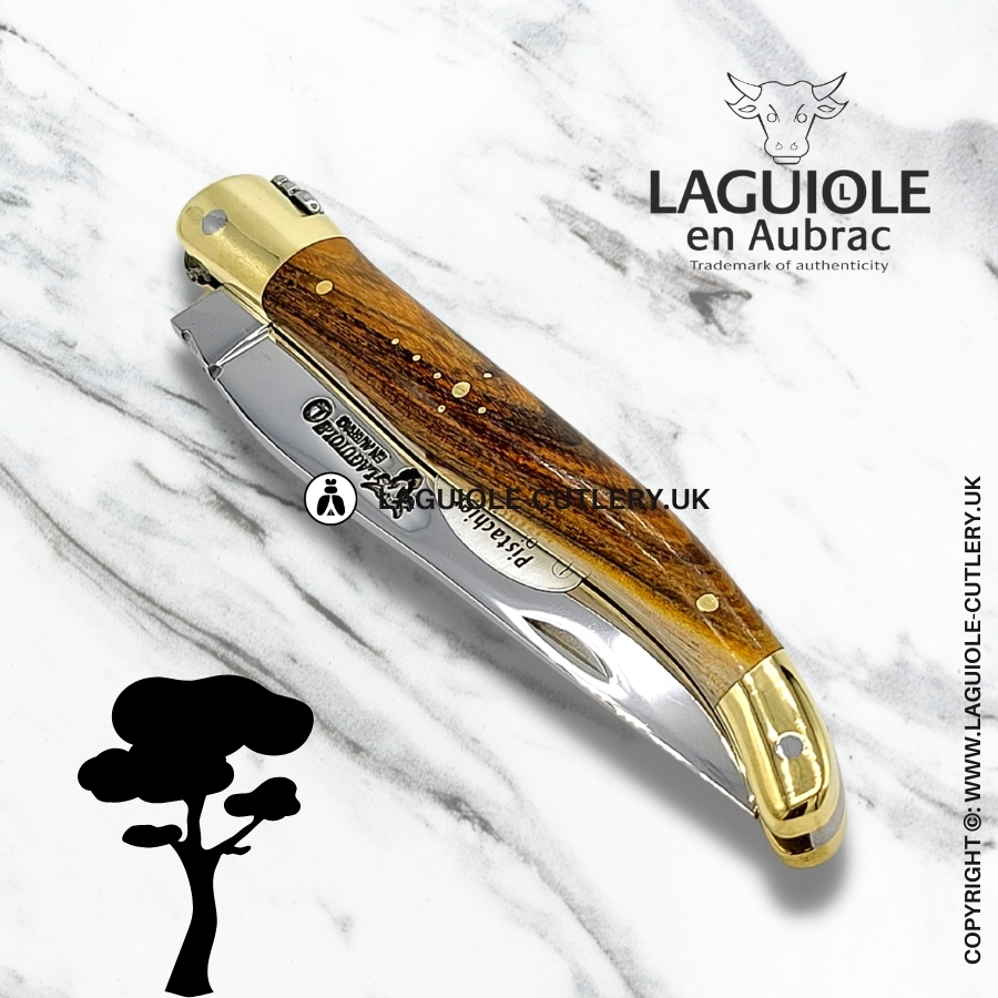 laguiole en aubrac pocket knife with pistachio wood handle and brass bolsters
