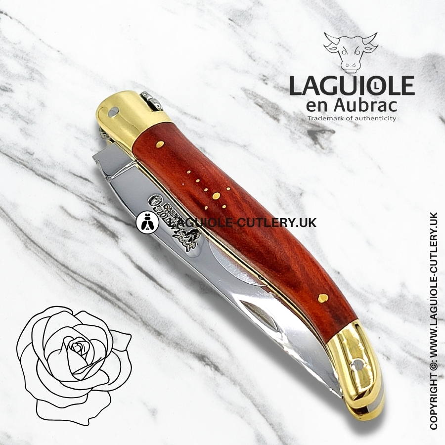 laguiole en aubrac pocket knife with red heart wood handle and brass bolsters