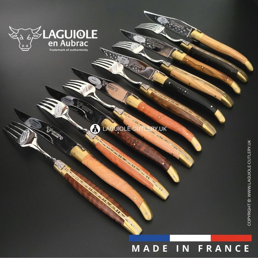laguiole 12 piece knife & fork set mixed wood – brass bolsters