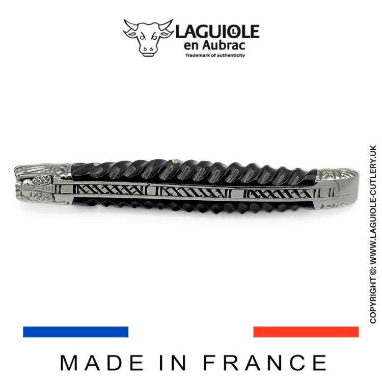 laguiole pocket knife with twisted ebony handle and chiselled spring and bolsters