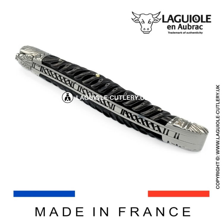 laguiole pocket knife with twisted ebony handle and chiselled spring and bolsters