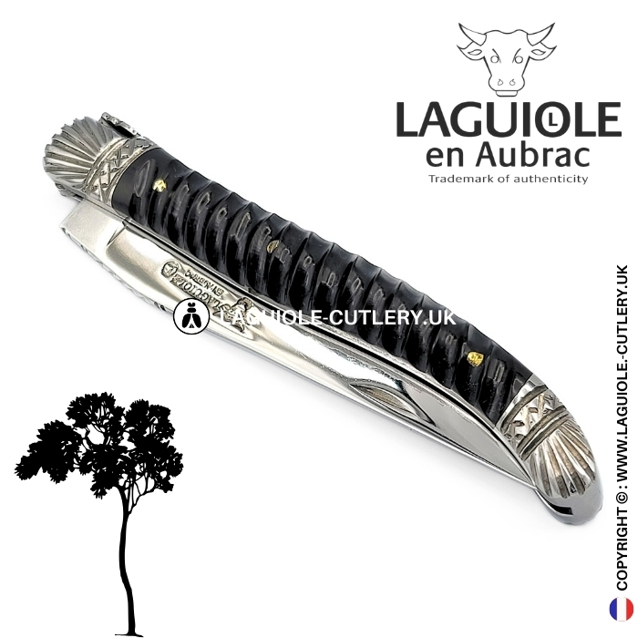 laguiole pocket knife with twisted ebony handle and chiselled spring and bolsters