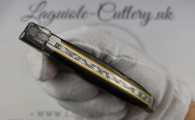 electric glow: laguiole pocket knife in laurel burl hand engraved bee and bolsters