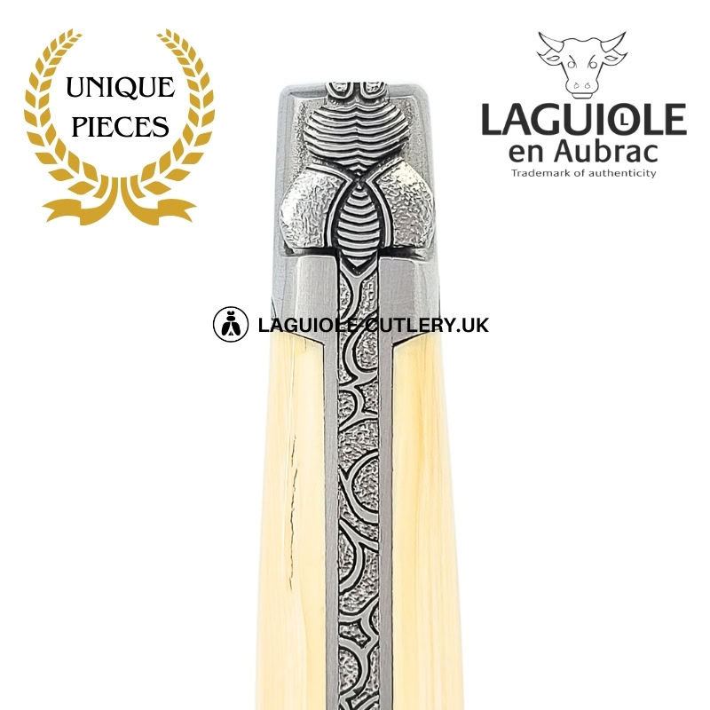 light of the ages: laguiole pocket knife in mammoth ivory – sculpted bee – hammered spring and bolsters