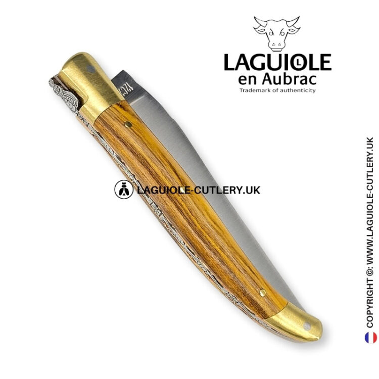 brass blossom: laguiole knife in pistachio wood – sculpted bee – brass bolsters and copper plates