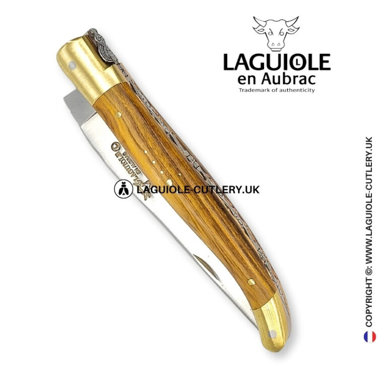 brass blossom: laguiole knife in pistachio wood – sculpted bee – brass bolsters and copper plates