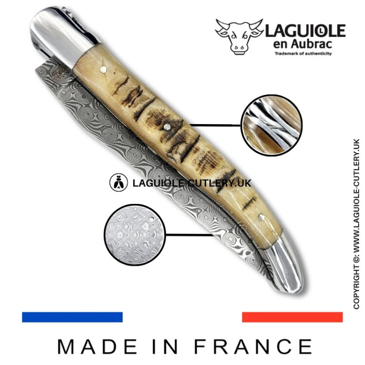 laguiole pocket knife double plates in ram horn with damascus blade